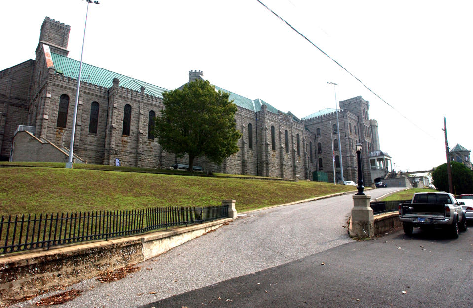 This Sept. 10, 2007, photo shows, the Kentucky State Penitentiary in Eddyville, Ky. One doctor has been fired and another is in the midst of being dismissed from penitentiary, after an inmate, James Kenneth Embry, went on a hunger strike and died Jan. 13, 2014. (AP Photo/Daniel R. Patmore)