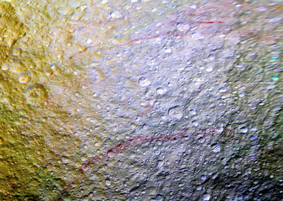 An arc-shaped red streak on the surface of Saturn's icy moon, Tethys.