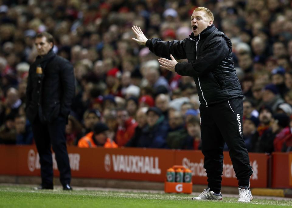 Bolton Wanderers' manager Neil Lennon (R) gestures during their FA Cup fourth round soccer match against Liverpool at Anfield in Liverpool, northern England January 24, 2015. REUTERS/Phil Noble (BRITAIN - Tags: SPORT SOCCER)