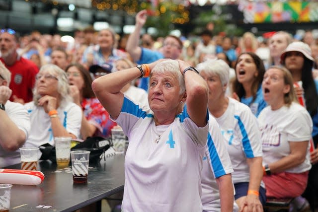 Fans watch Spain v England