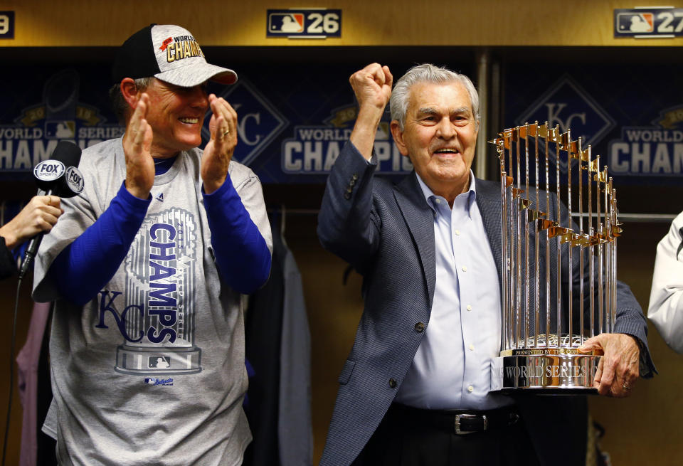 FILE - In this Nov. 2, 2015, file photo, Kansas City Royals owner David Glass, right, and manager Ned Yost celebrate after Game 5 of the Major League Baseball World Series against the New York Mets in New York. Former Walmart Inc. chief executive Glass, who owned the Royals for nearly two decades before selling the franchise last fall, died last week of complications form pneumonia. He was 84. (Al Bello/Pool via AP, File)