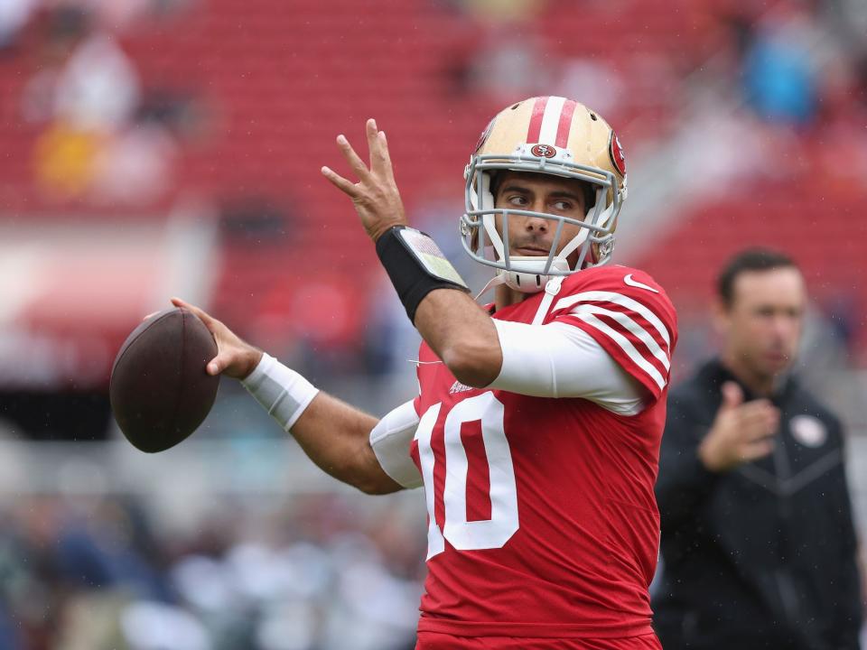 Jimmy Garoppolo warms up ahead of a game against the Seattle Seahawks.