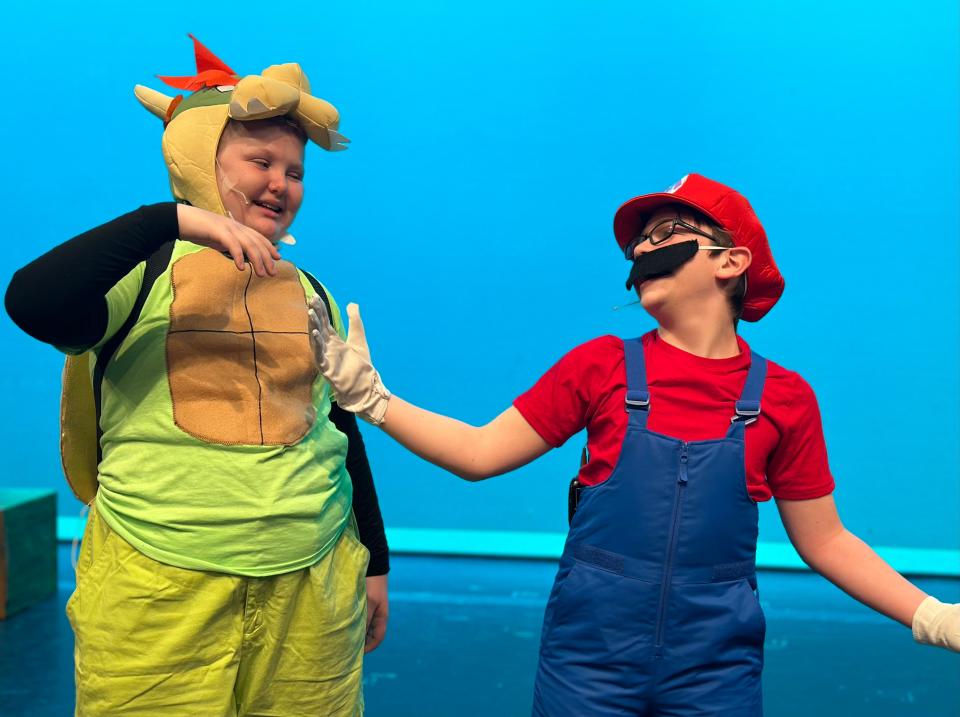 Austin VanPeteghem, left, as Spikey Turtle and Connor Bird as Marco the Plumber in the Abbey Theater of Dublin production "Press Start!"