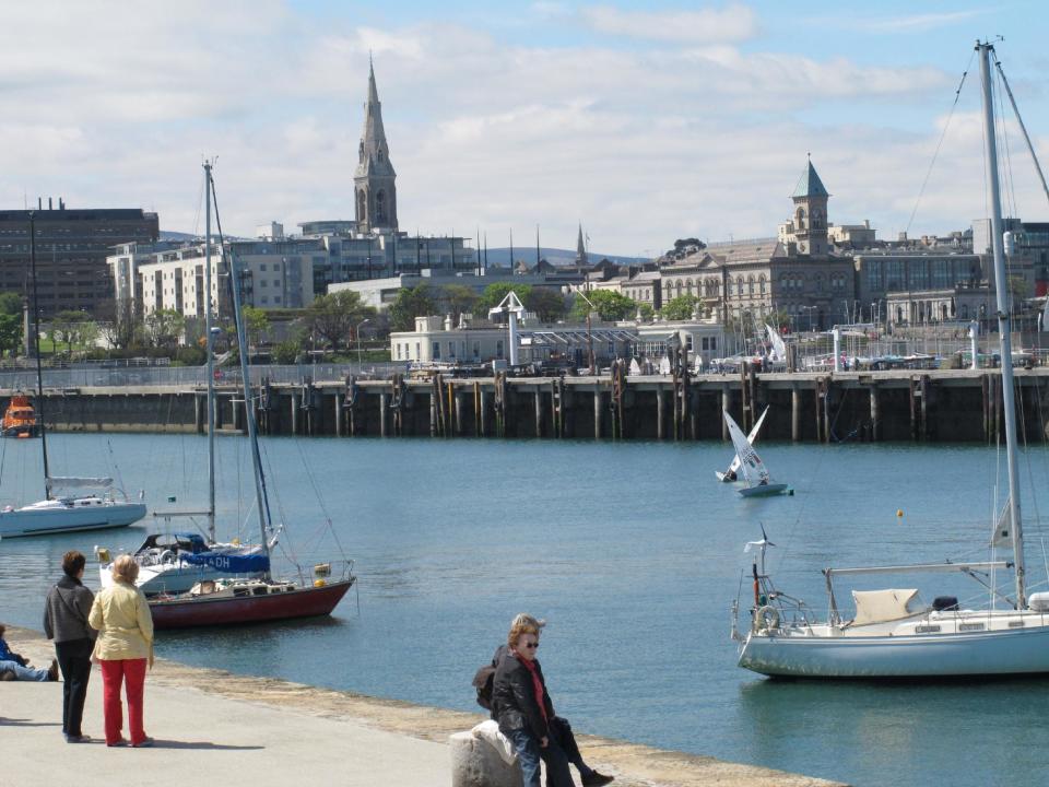 This May 18, 2013 photo shows the pier in Dun Laoghaire harbor in Country Dublin, Ireland. Hard times in the 1950s and 1960s drove thousands of young Irish to emigrate from the harbor, catching the ferry to Britain in search of jobs. Some returned for an emotional reunion as part of The Gathering, a yearlong event in Ireland inviting its emigrants and their descendants home. (AP Photo/Helen O'Neill)