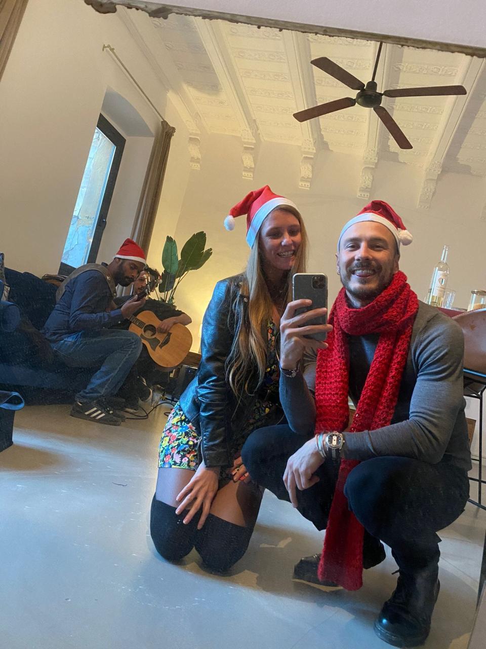 jordan mautner and friend in santa hats