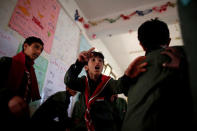 Boys attend a class at the school of The al-Shawkani Foundation for Orphans Care in Sanaa, Yemen, December 25, 2016. REUTERS/Khaled Abdullah