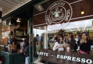 <p>Before Starbucks was a global chain, it was just a popular coffee shop in Pike Place Market in Seattle, WA. The original store that started it all opened in 1971. </p>