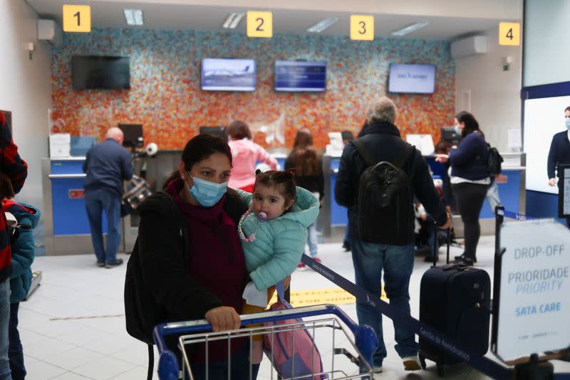 People leave Sao Jorge island on the last commercial flight of the day, in Velas, Azores