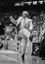 FILE - In this April 1, 1985, file photo, Villanova coach Rollie Massimino is up on his toes during the NCAA college basketball Final Four championship game against Georgetown, in Lexington, Ky. Underdog Villanova, shooting 79 percent from the field, beat Georgetown 66-64. No one thought we could do it, but I did,” Villanova coach Rollie Massimino shouted afterward. (AP Photo/Bob Jordan, File)