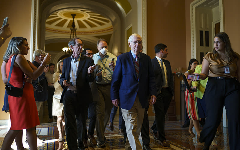 Minority Leader Mitch McConnell (R-Ky.) returns to his office after speaking on the Senate Floor