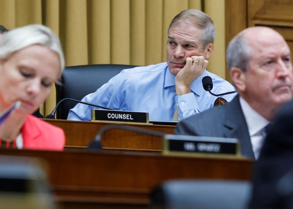 House Judiciary Committee Chair Jim Jordan looks bored at his desk.