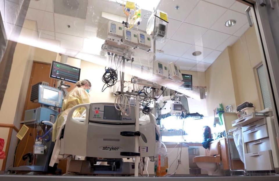 <div class="inline-image__caption"><p>"Brennan Magagna, RN, works at the bedside of a COVID-19 patient in the Intensive Care Unit at Saint Alphonsus Regional Medical Center in Boise, ID."</p></div> <div class="inline-image__credit">Courtesy Saint Alphonsus Health System</div>