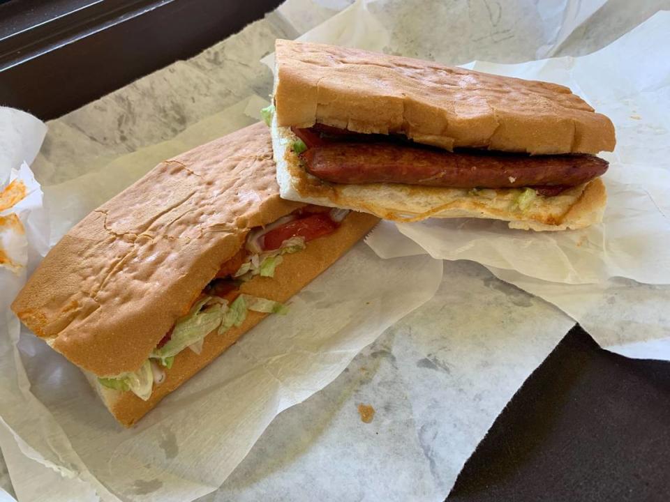 The cajun sausage and buffalo chicken bacon ranch po’boys at the Pirate’s Cove in Pass Christian, Mississippi.