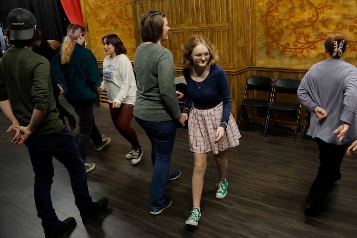 Choreographer Rebekah Valencia, center, and Brenna McDonnell, the 13-year-old daughter of The Oklahoman Features Writer Brandy McDonnell, rehearse a Regency Era dance for Oklahoma Shakespeare in the Park's production of "Jane Austen's Christmas Cracker" on Nov. 28 in Oklahoma City.