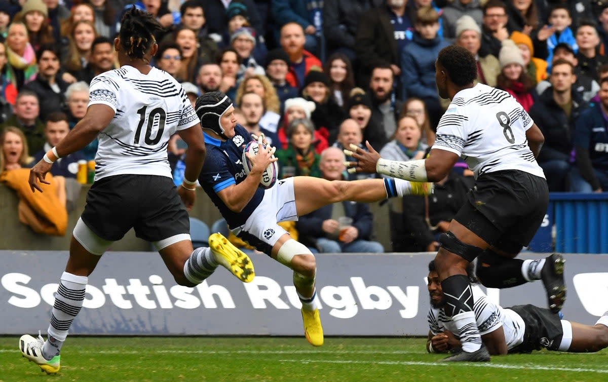 Fiji's scrum-half Frank Lomani (2R) tackles Scotland's wing Darcy Graham during the Autumn Nations Series (AFP via Getty Images)