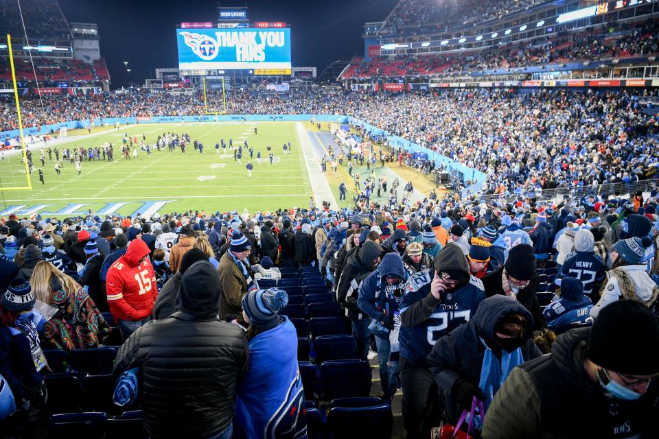 Titans fans start to leave Nissan Stadium after their team lost to the Bengals during the AFC divisional playoff game Saturday, Jan. 22, 2022 in Nashville, Tenn. 