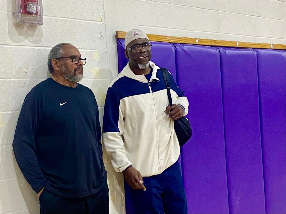 Former LBJ basketball player Ray Jackson, right, better known as part of the University of Michigan's Fab Five, said he's confident the Jaguars will regain their status as district champions next year.