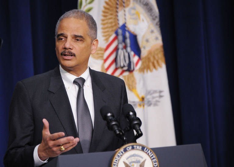 US Attorney General Eric Holder speaks on February 20, 2013 at the Eisenhower Executive Office Building in Washington, DC. The US government vowed to aggressively combat a rise in the foreign theft of trade secrets amid mounting concerns over recent hacking attacks allegedly emanating from China