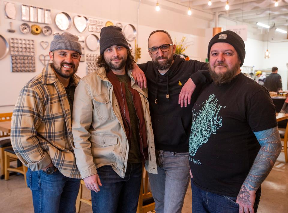 Restaurant operators Haunt of Hounds,from left, Austin Cabello,  Jordan Mullins, Tim Tinker and Alain Helfrich, will now oversee operations at the Dainty Maid restaurant space in South Bend.