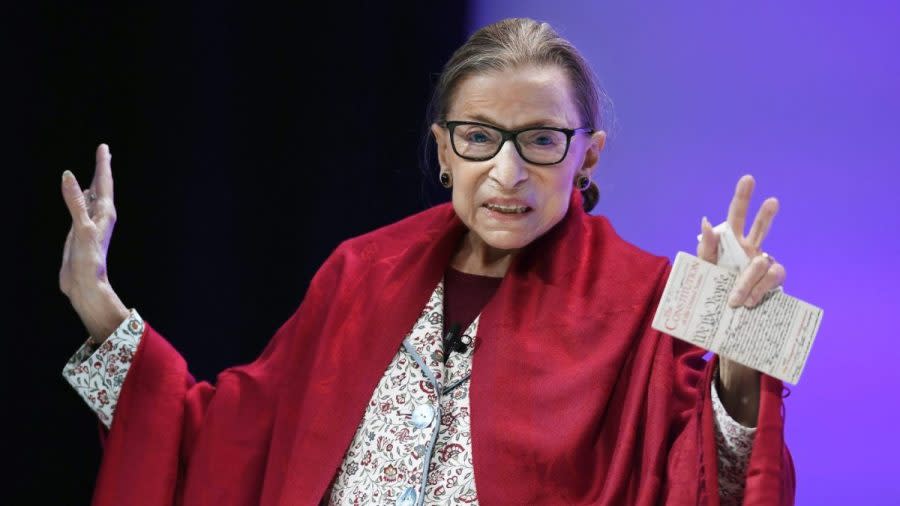 In this Oct. 3, 2019 file photo, U.S. Supreme Court Justice Ruth Bader Ginsburg gestures to students before she speaks at Amherst College in Amherst, Mass, on Oct. 3, 2019. Ginsburg is being remembered during ceremonies at the Supreme Court on Friday, March 17, 2023. (AP Photo/Jessica Hill, File)