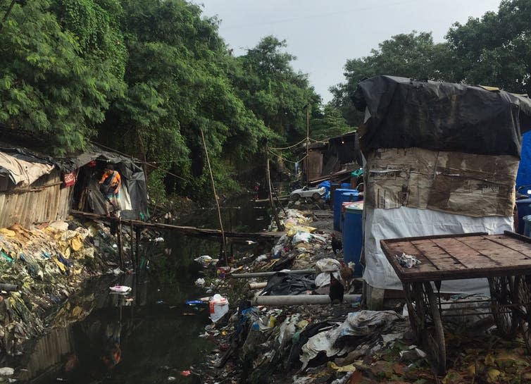 <span class="caption">Self-constructed toilets in Siddharth Nagar, Mumbai.</span> <span class="attribution"><span class="source">Purva Dewoolkar</span>, <span class="license">Author provided</span></span>