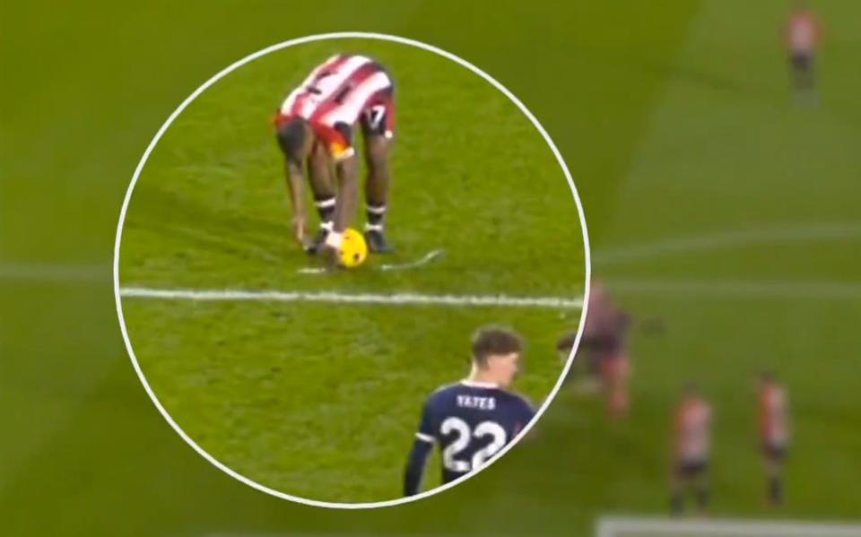 Ivan Toney places the foam to the right of the ball