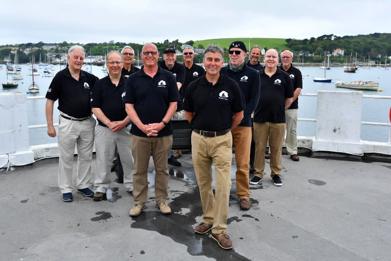 Sea Shanty singing group Bryher's Boys pose for a picture at Prince Wales Pier in Falmouth