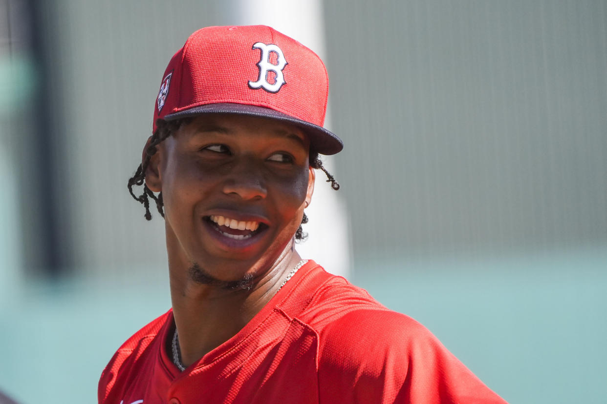 Red Sox pitcher Brayan Bello leaves the field after a workout during spring training in Fort Myers, Fla., Thursday, Feb. 15, 2024. (AP Photo/Gerald Herbert)