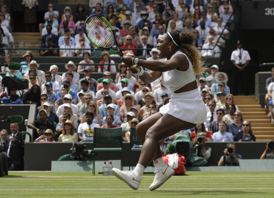 FILE - In this July 8, 2019, file photo, United States' Serena Williams returns the ball to Spain's Carla Suarez Navarro in a women's singles match during day seven of the Wimbledon Tennis Championships in London. After the traditional middle Sunday off, Wimbledon would have resumed this week with what some consider the most exciting day of tennis: The second Monday, when all 16 men’s and women’s singles matches in the fourth round are scheduled. Of the 19 times Williams has entered Wimbledon, she reached Week 2 of the fortnight on 16 occasions; that includes seven of her 23 Grand Slam singles trophies and another four runner-up finishes, including in 2018 and 2019. (AP Photo/Kirsty Wigglesworth, File)