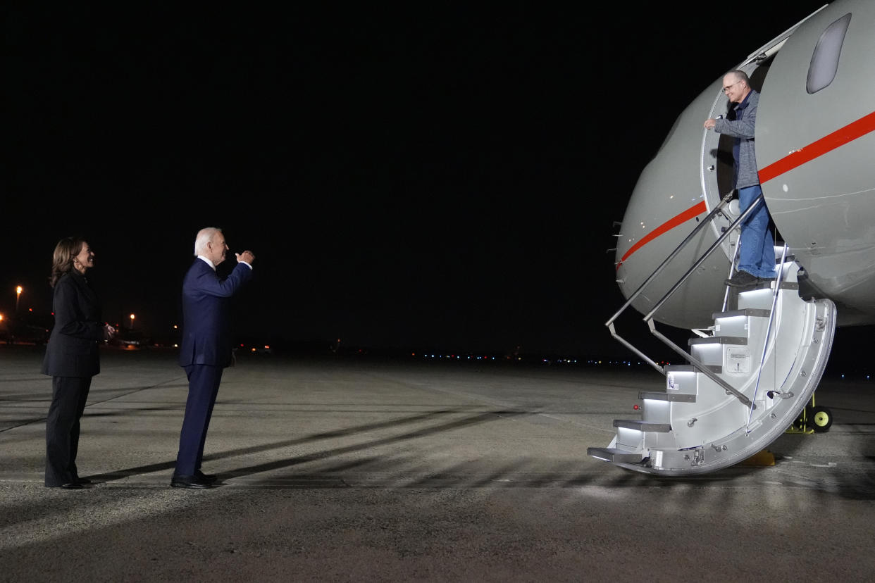 Vice President Kamala Harris and President Joe Biden greet Paul Whelan at Andrews Air Force Base.