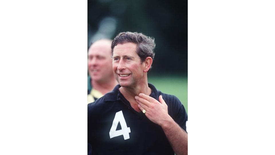 The then Prince of Wales wearing his signet ring and wedding ring to Princess Diana in 1993