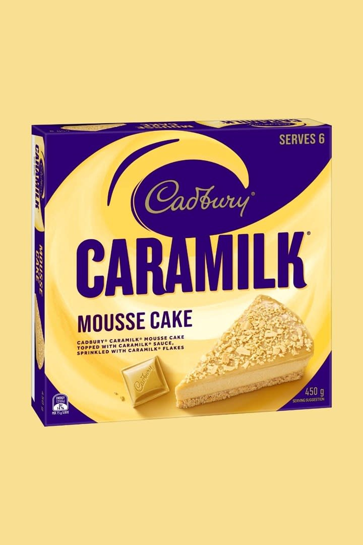  Box of Caramilk Mousse Cake in gold and purple packaging.