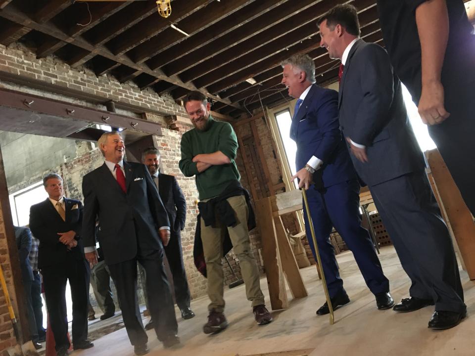 Then-Montgomery Mayor Todd Strange and Italian Senator Massimo Mallegni share a laugh with chef Gianluca Tolla, center, in 2019 at a groundbreaking for Ravello restaurant in downtown Montgomery.