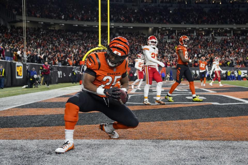 Cincinnati Bengals running back Chris Evans scores against the Kansas City Chiefs.