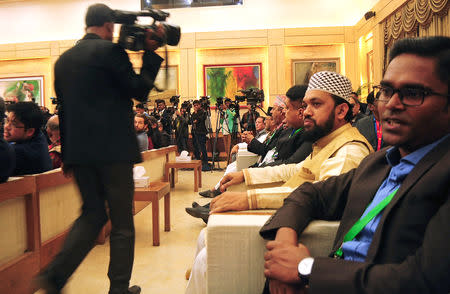 Abed Ali, the secretary general of SAARC Human Rights Foundation, sits among foreign observers and journalists during a gathering at Prime Minister Sheikh Hasina's residence in Dhaka December 31, 2018. Picture taken December 31, 2018. REUTERS/Zeba Siddiqui
