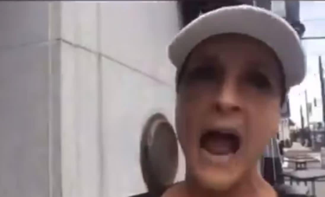Former conservative talk radio host Dianna Ploss yells into her camera after harassing a group of Spanish-speaking workers for not speaking English: Facebook