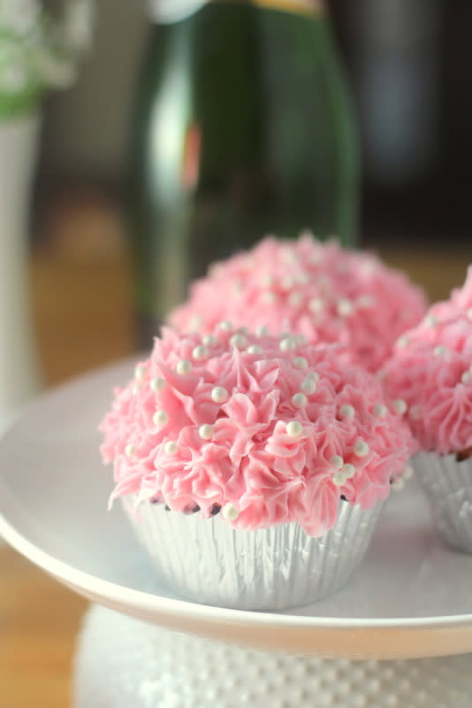 <p>Blackberry Babe</p><p>Simply mix champagne with the cake mix and a few drops of red dye, and you’re on your way! </p><p><strong>Get the recipe here: <a href="https://blackberrybabe.com/2015/10/03/pink-champagne-cupcakes/" rel="nofollow noopener" target="_blank" data-ylk="slk:Pink Champagne Cupcakes;elm:context_link;itc:0;sec:content-canvas" class="link ">Pink Champagne Cupcakes</a></strong></p>