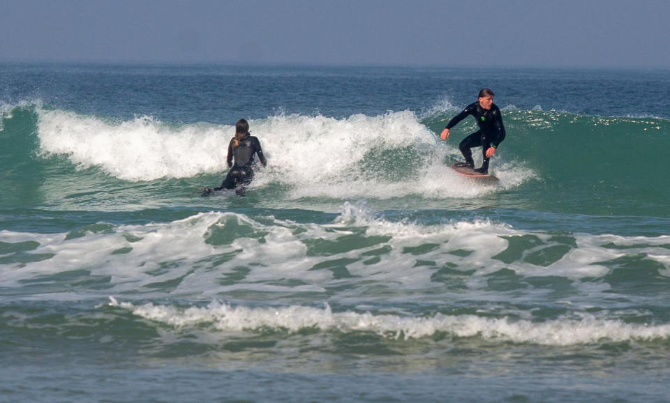  See SWNS story SWPLsurf. Despite surfing been banned  in Itlay, Spain and France the water sport hasn't been explicitly restricted in the UK. Government guidance is that people shouldn't be driving to do their daily excercise so if surfers can walk to the beach that could be allowable under current UK lockdown rules 