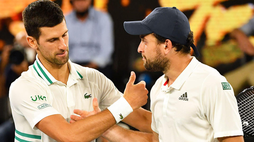 Pictured here, Aslan Karatsev and Novak Djokovic congratulate each other at the end of the match.