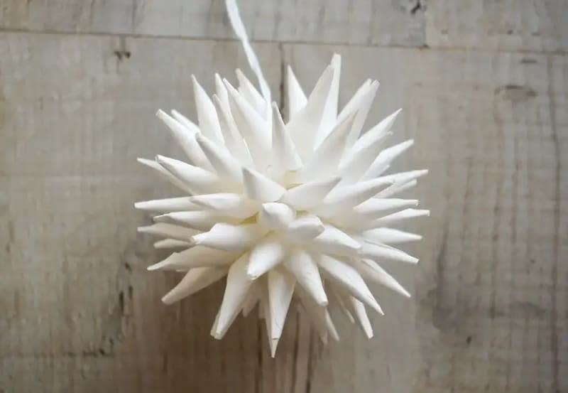 White paper three-dimensional sputnik-style star ornament