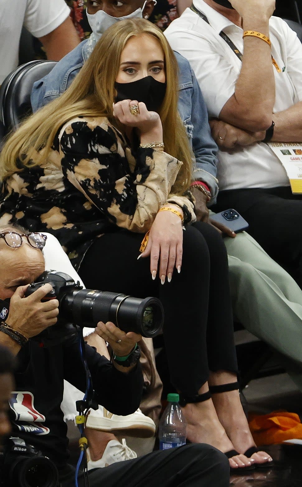 Singer Adele looks on during the first half in Game Five of the NBA Finals between the Milwaukee Bucks and the Phoenix Suns at Footprint Center on July 17, 2021 in Phoenix, Arizona.