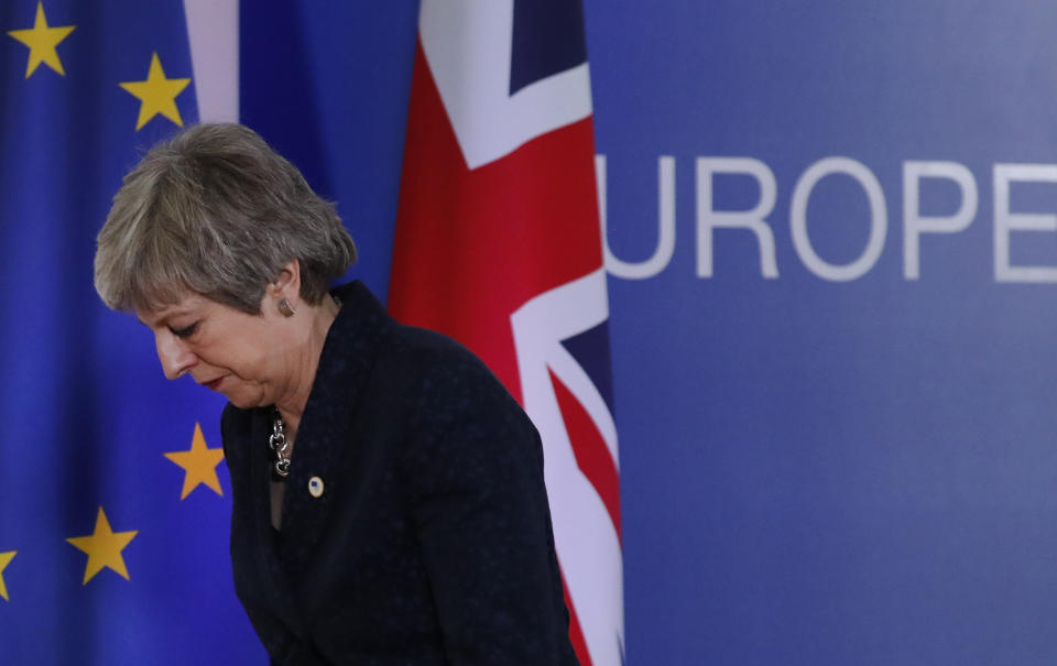 FILE - Then-British Prime Minister Theresa May leaves after addressing a media conference at an EU summit in Brussels, Friday, March 22, 2019. Former British Prime Minister Theresa May announced Friday, March 8, 2024, that she will quit as a lawmaker when an election is called this year, ending a 27-year parliamentary career that included three years as the nation’s leader during a period roiled by Brexit. (AP Photo/Frank Augstein, File)