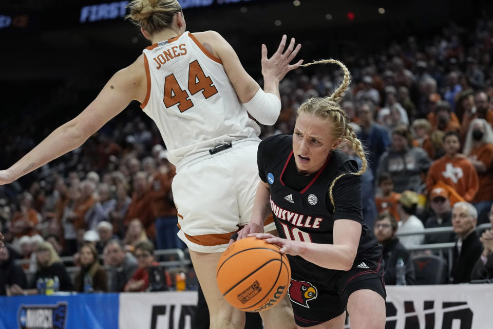 Louisville guard Hailey Van Lith (10) drives around Texas forward Taylor Jones (44) during the first half of a second-round college basketball game in the NCAA Tournament in Austin, Texas, Monday, March 20, 2023. (AP Photo/Eric Gay)