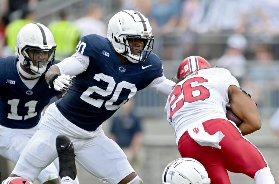 Penn State defensive end Adisa Isaac reaches to stop Indiana’s Josh Henderson during the game Saturday, Oct. 28, 2023. Abby Drey/adrey@centredaily.com