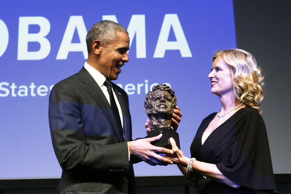 Robert F. Kennedy Human Rights President Kerry Kennedy presents former President Barack Obama with the foundation's Ripple of Hope Award at a ceremony, Wednesday, Dec. 12, 2018, in New York. (AP Photo/Jason DeCrow)