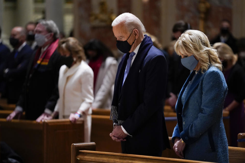 FILE - In this Wednesday, Jan. 20, 2021 file photo, President-elect Joe Biden and his wife, Jill Biden, attend Mass at the Cathedral of St. Matthew the Apostle during Inauguration Day ceremonies in Washington. When U.S. Catholic bishops hold their next national meeting in June 2021, they’ll be deciding whether to send a tougher-than-ever message to President Joe Biden and other Catholic politicians: Don’t partake of Communion if you persist in public advocacy of abortion rights. (AP Photo/Evan Vucci, File)