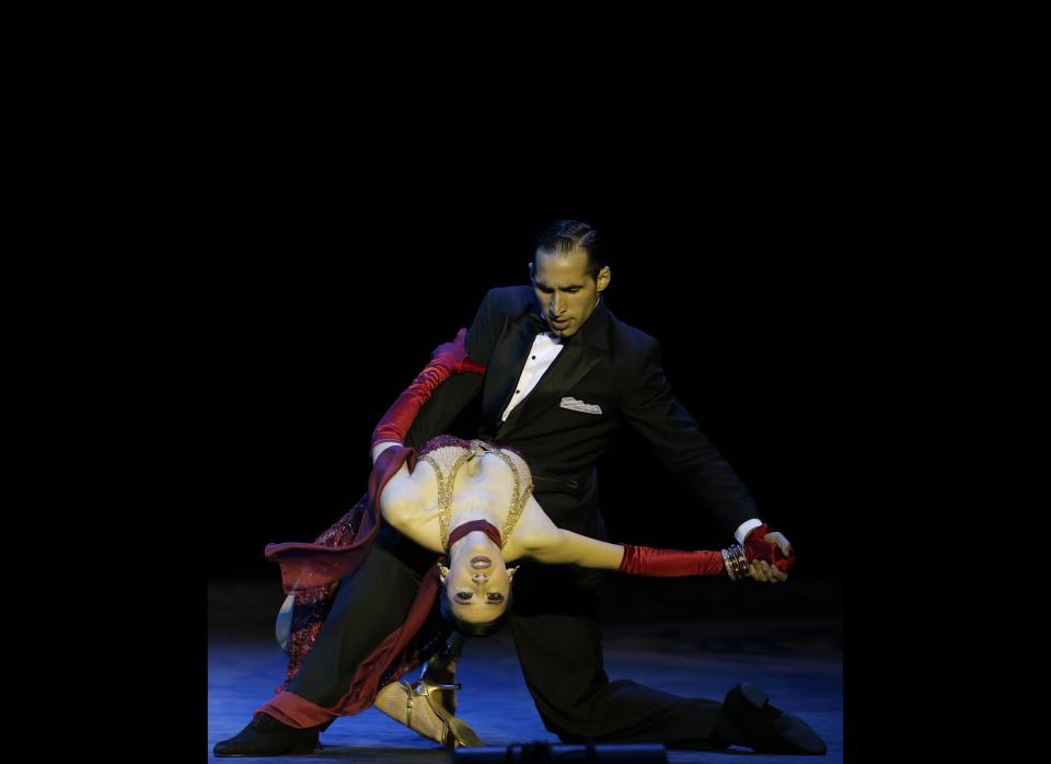 Argentina's Ariel Leguizamon, top, and Yesica Esquivel compete during the 2012 Tango Dance World Cup stage finals in Buenos Aires on Aug. 28, 2012.&nbsp;