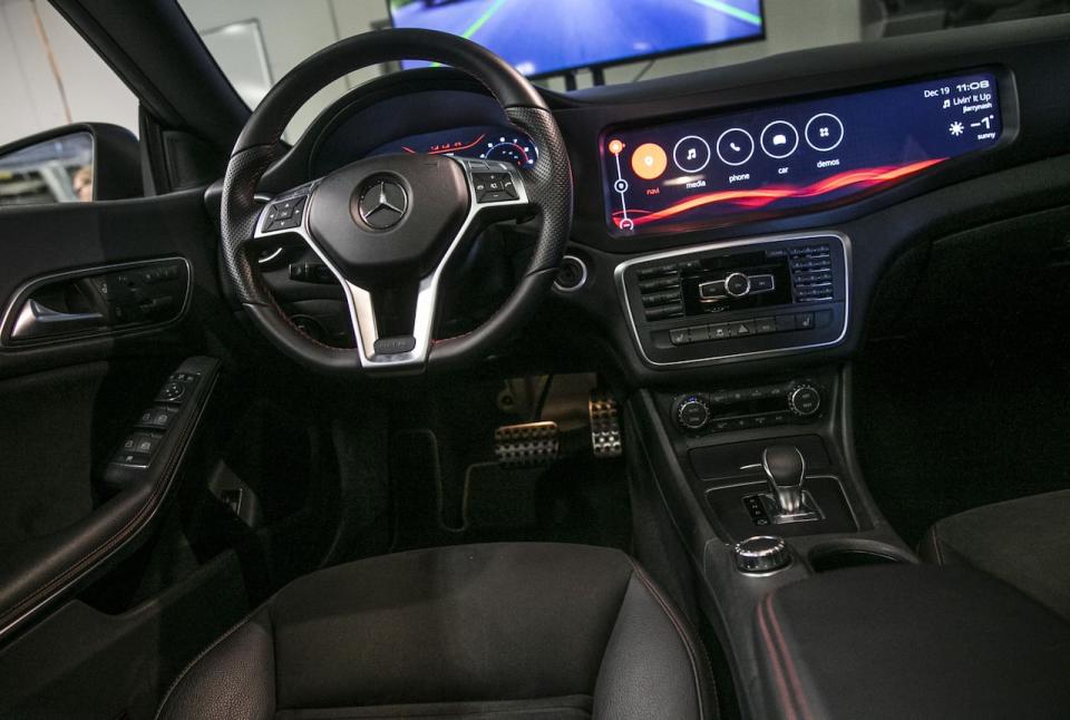 The interior of a Mercedes-Benz AG CLA 45 AMG is seen at the Blackberry Ltd. QNX headquarters in Ottawa, Ontarion, Canada, on Monday, Dec. 19, 2016. BlackBerry Ltd. and Canada are opening a research center for self-driving cars that raises the possibility of government backing for the former smartphone maker's automotive software unit. Photographer: Chris Roussakis/Bloomberg