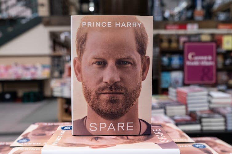 Spare's cover showing Prince Harry's face.