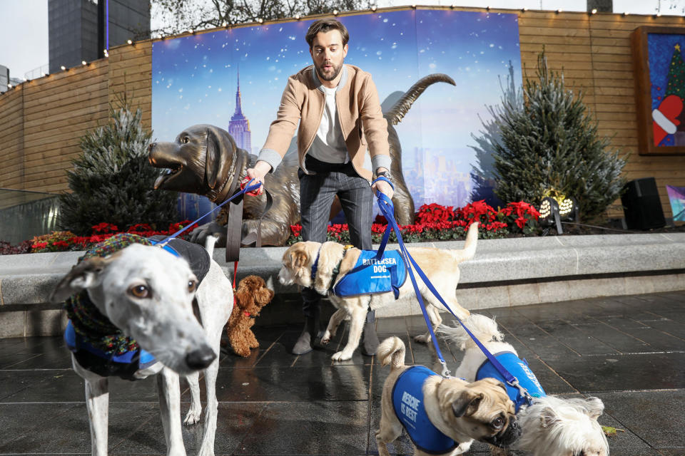 <p>Jack Whitehall unveils the new statue of Clifford the Big Red Dog in London's Leicester Square on Dec. 5. </p>